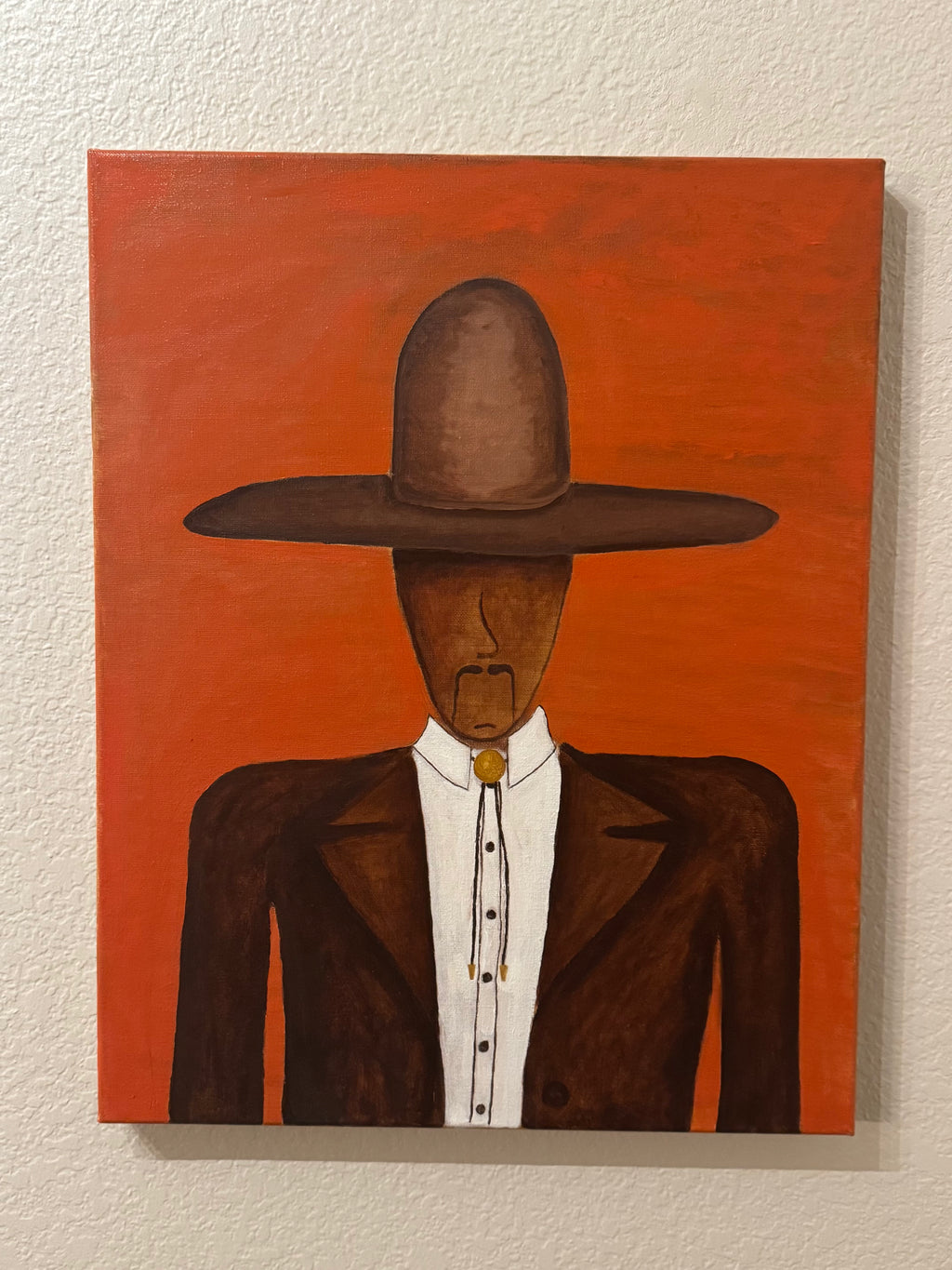 Painting of a figure wearing a wide-brimmed hat on an orange background